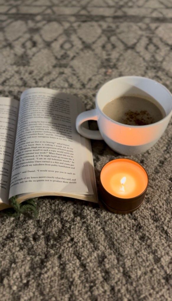 cozy. candle. book. beverage
